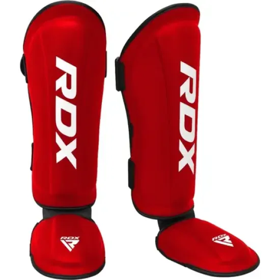 Lichte en duurzame RDX Sports scheenbeschermers met schokabsorberende technologieën voor optimale bescherming en comfort in de ring.